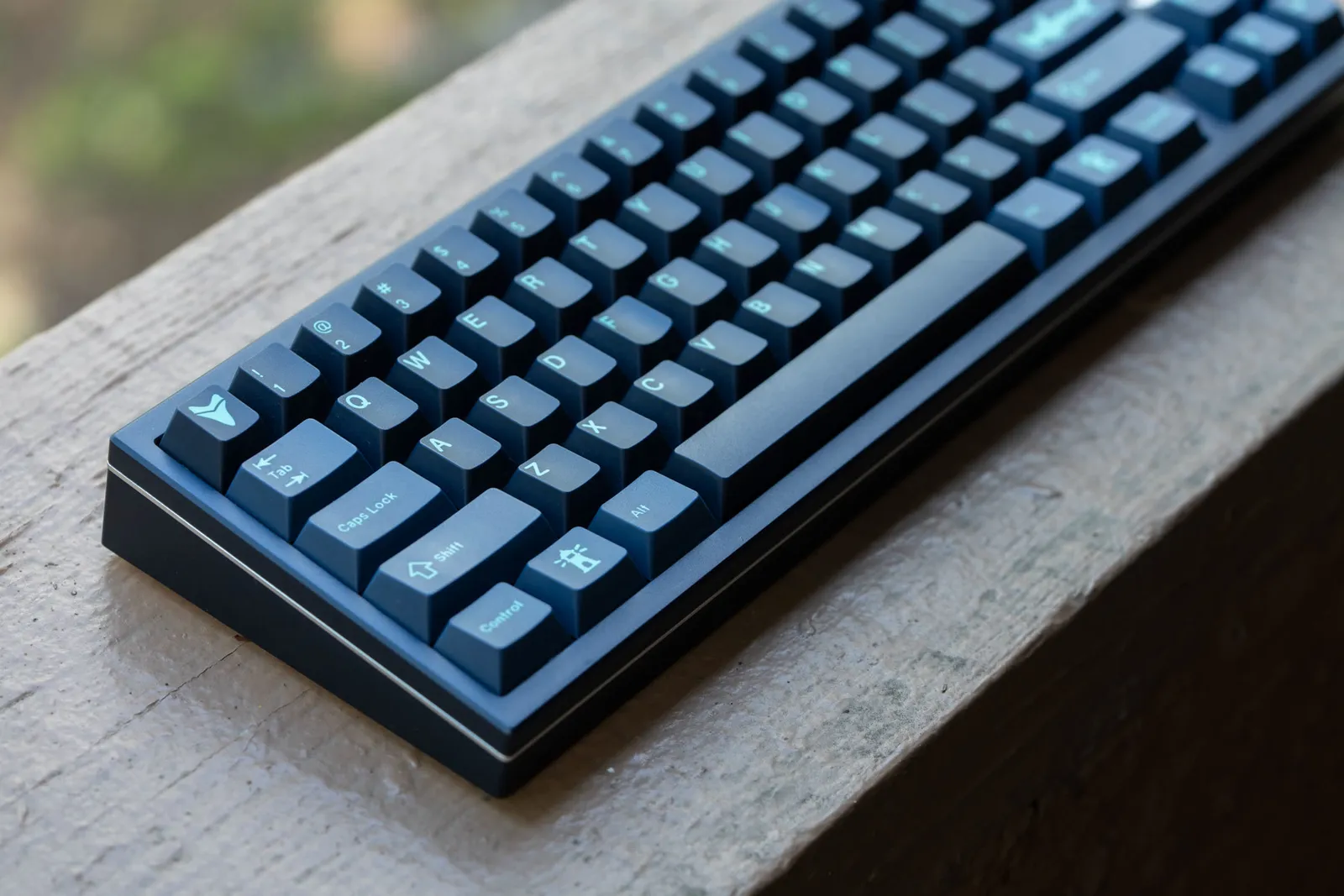 The Aozora 69 — a dark-blue milled-aluminum 65% mechanical keyboard.