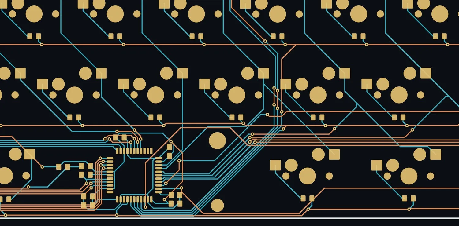 Close-up of the ATmega32U4 and its routing fan-out into the key matrix.